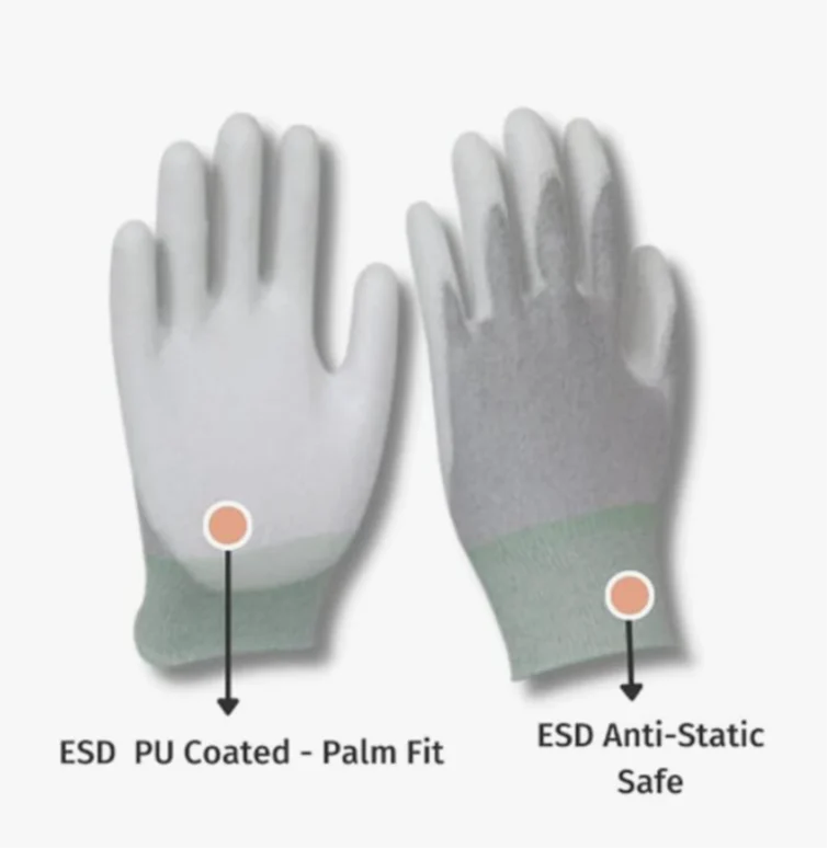Worker wearing ESD gloves handling PCB